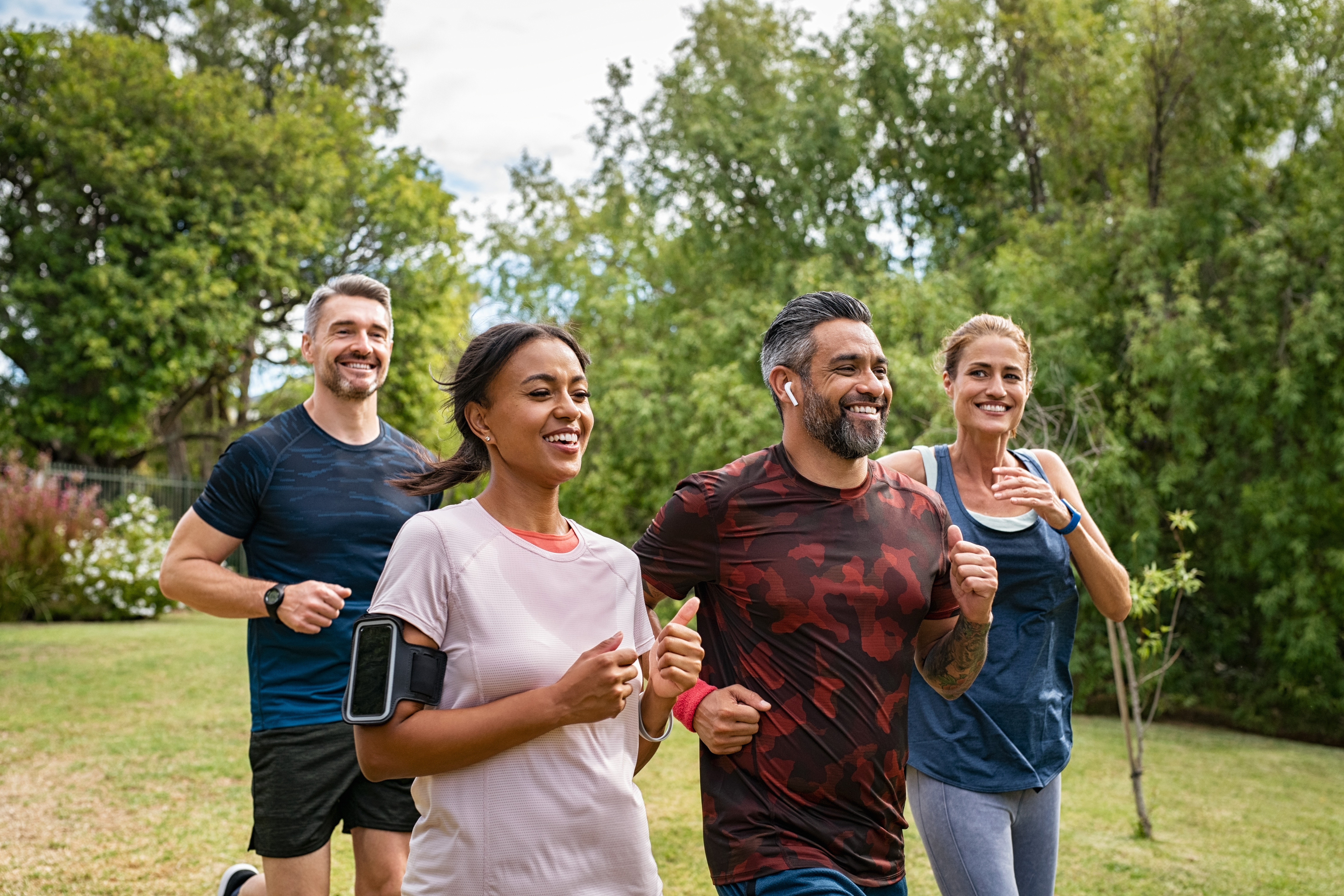 Healthy,Group,Of,Multiethnic,Middle,Aged,Men,And,Women,Jogging